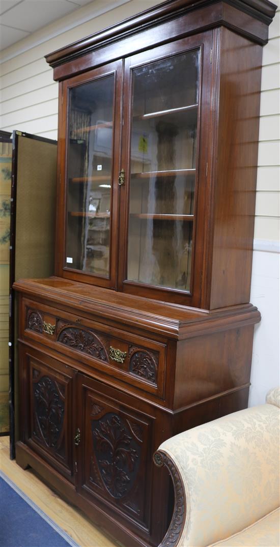 An Edwardian carve walnut secretaire bookcase, H.226cm